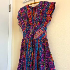 Bright vintage house dress with slash pockets